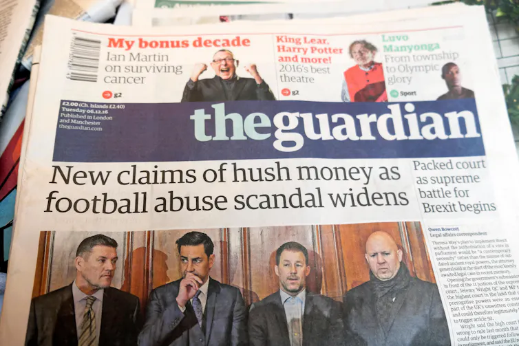 Front page of the Guardian newspaper with the headline 'New claims of hush money as football abuse scandal widens'