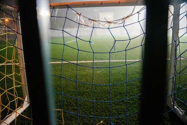 Football net with a hole in it