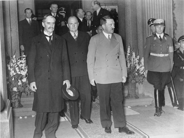Picture from German Feberal Archives showing then British prime minister Neville Chamberlain with German leader Adolph Hitler, Munich 1938.