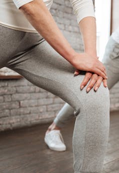 Woman in exercise class.