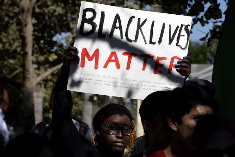 A Black Lives Matter demonstration in Los Angeles in August 2014, following the killing of Mike Brown, fatally shot by police in Ferguson, Missouri.