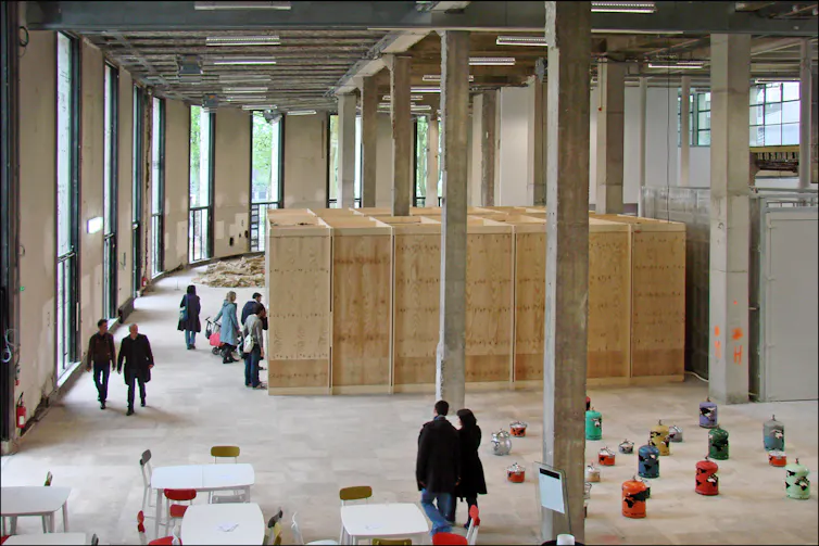 An interior shot from above of exhibition spaces in the Palais de Tokyo contemporary art gallery, in Paris