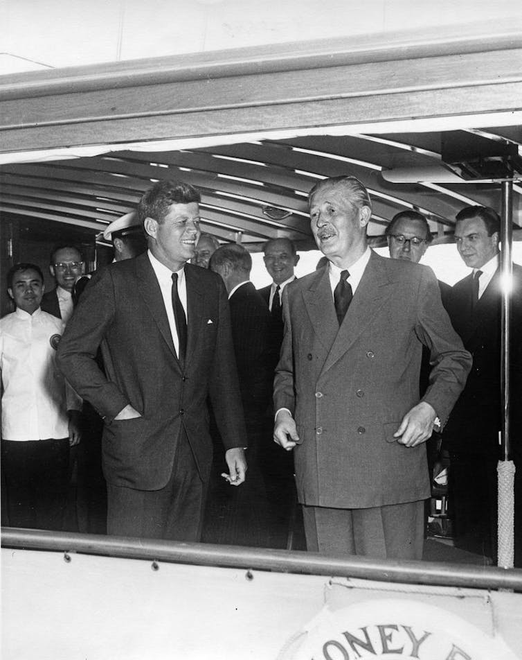 Kennedy and Great Britain's Prime Minister Harold Macmillan on the presidential yacht.