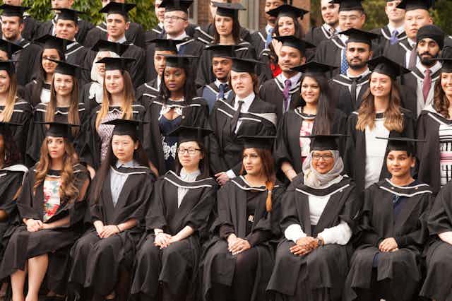 University graduates sitting in rows