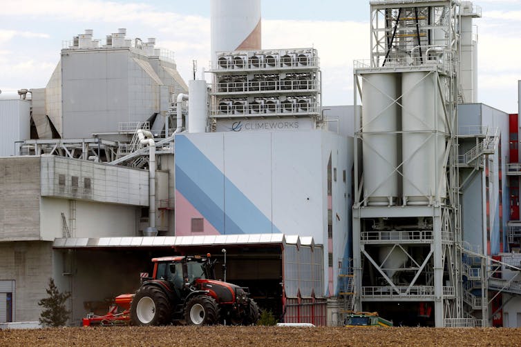 Climeworks factory with tractor in foreground.