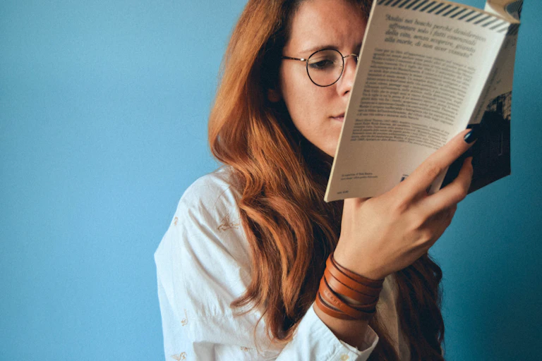 Woman sitting reading a book