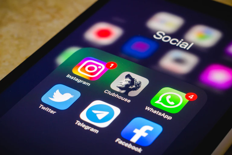 Social media apps displayed on a cell phone screen
