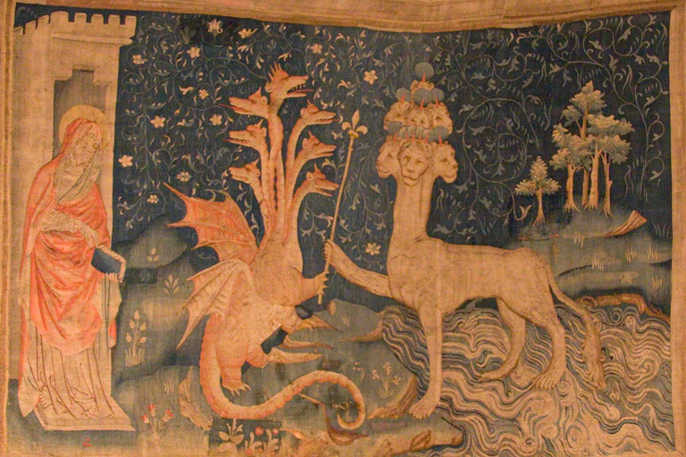A medieval tapestry, which shows John, the Dragon, and the Beast of the Sea.