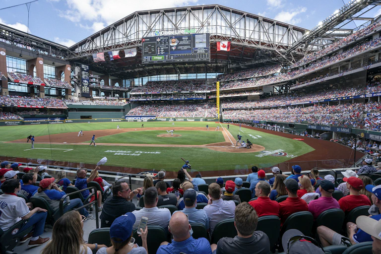Fans filling the Rangers baseball stadium