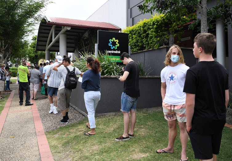 Newly unemployed queue at the Centrelink office in Southport on the Gold Coast, Queensland, March 23 2020.