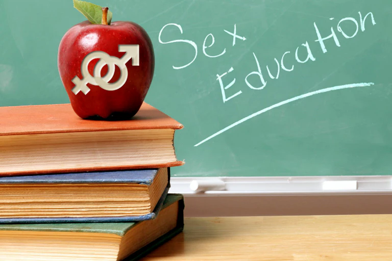 An apple on a desk indicating sex education