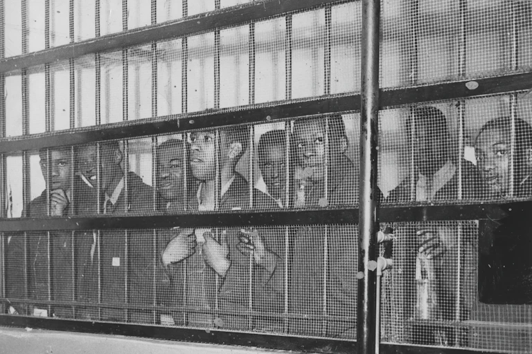 The Friendship Nine members behind bars in jail.