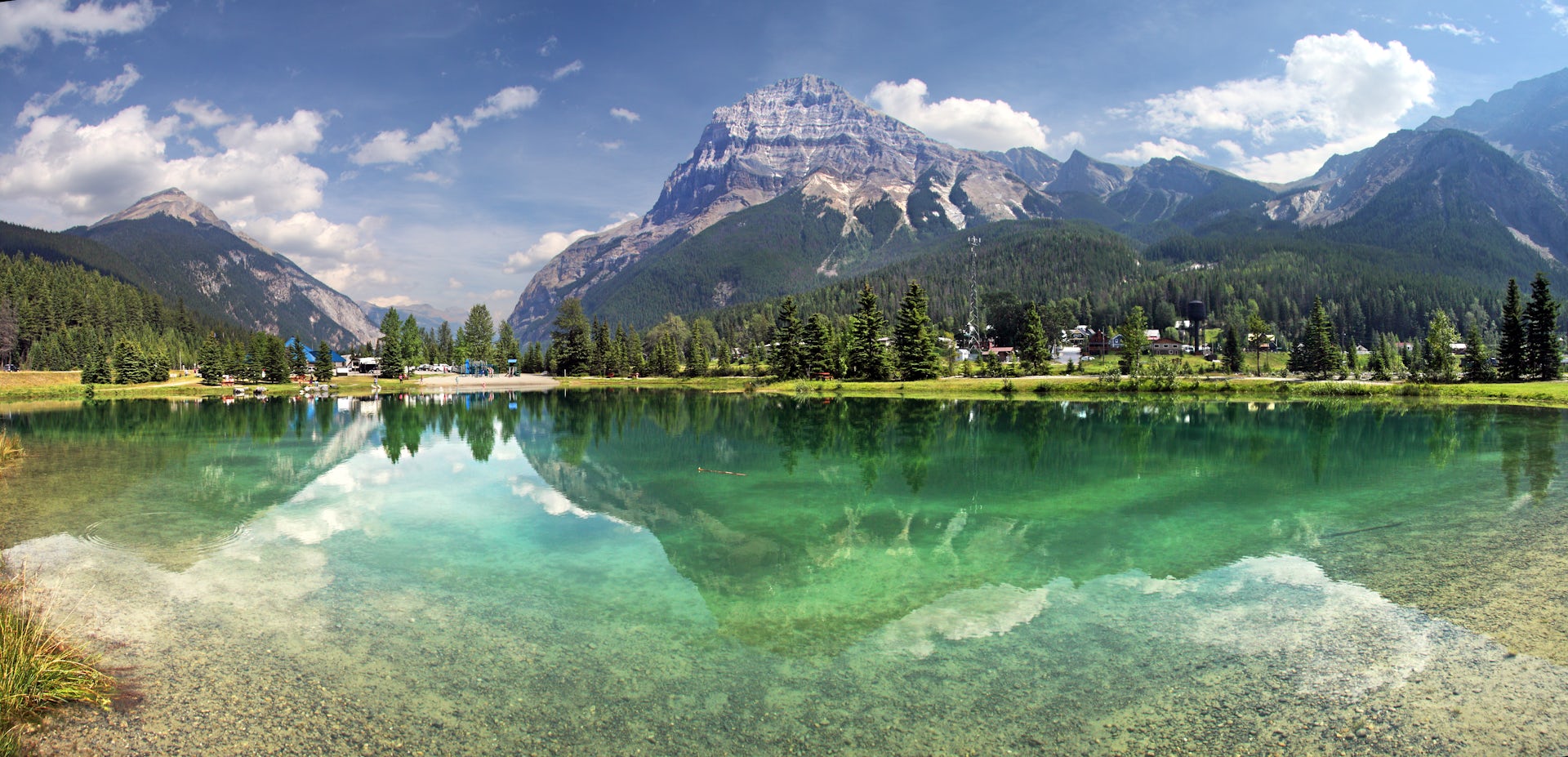 Mount Steven reflects into pond in Field, British Columbia