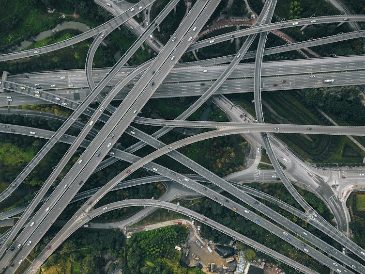 A bunch of highways overlap and connect to one another in a complex pattern.