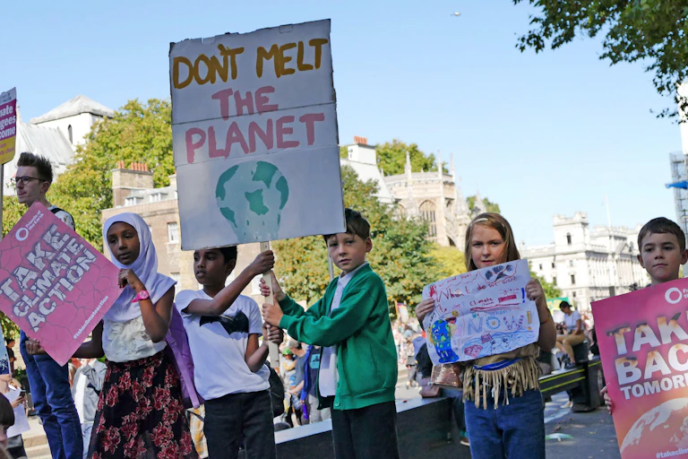 Children hold up posters at the 20th September 2019 climate strike in London