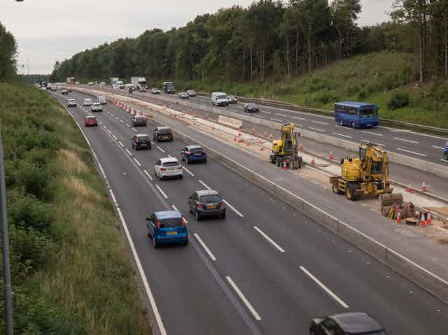 The M1 motorway being extended to accommodate an extra lane.