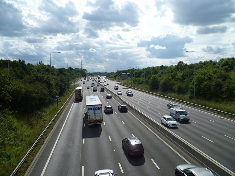 Two four-lane motorways side by side.