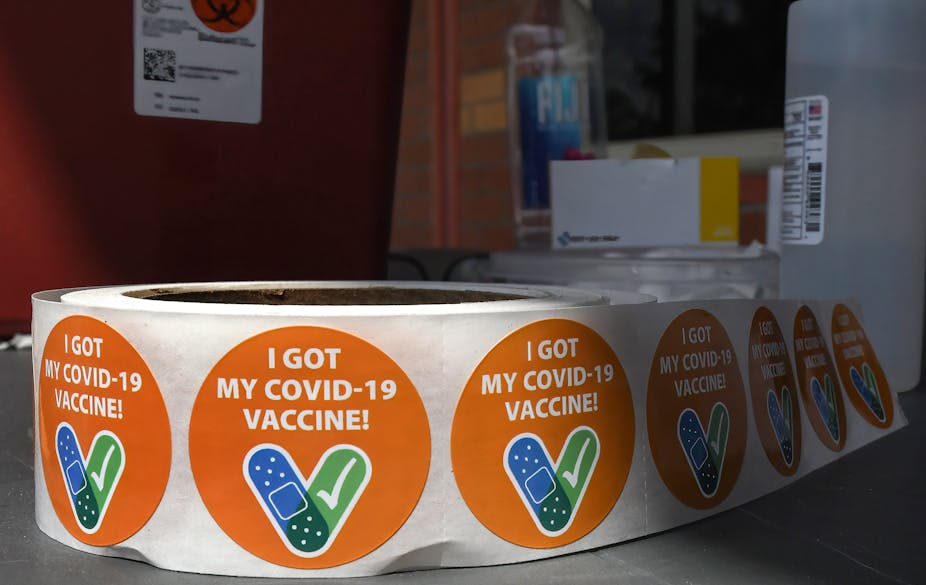 A roll of stickers printed with the words "I got my COVID-19 vaccine"