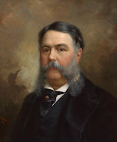 A portrait of President Chester A. Arthur, with long gray whiskers.