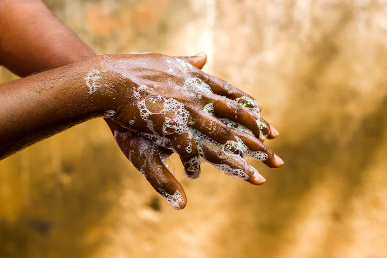 Man washing his hands