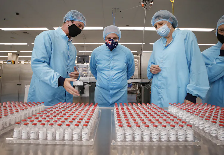 Prime Minister Scott Morrison inspecting AstraZeneca production.