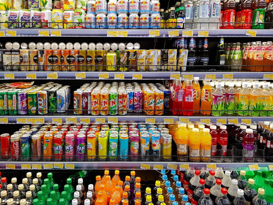 Supermarket shelves full of beverages
