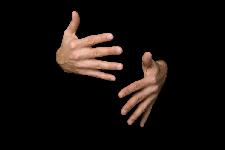 Image of hands using sign language
