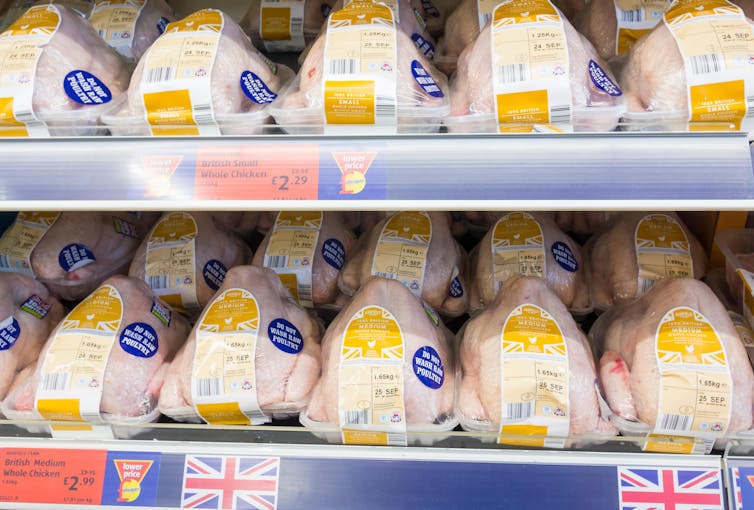 Whole chickens on sale for £2.99 in supermarket.
