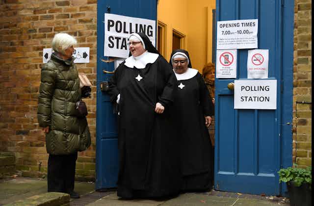 Two nuns leave a polling station after voting in the 2019 general election. 