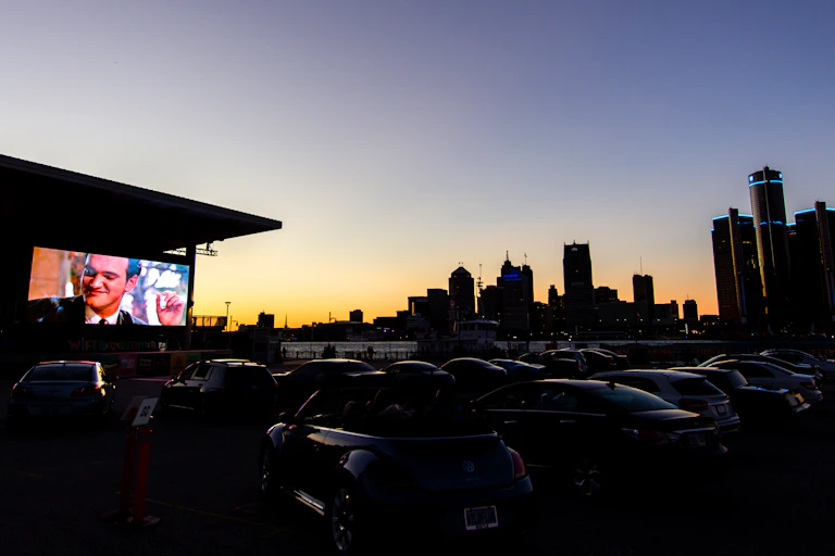 Drive in screen seen at night.