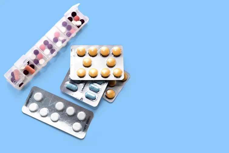 Some pills in their packaging