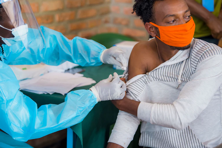 A person gets vaccinated