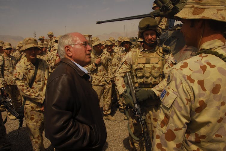 Prime Minister John Howard talks to troops in Afghanistan in 2007.