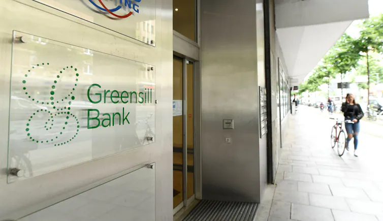 Sign for 'Greensill bank' outside office on city street