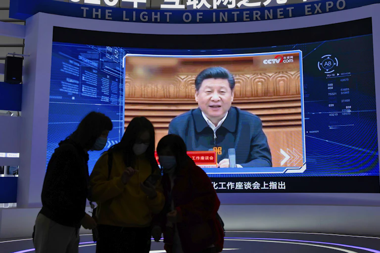 Ji Xinping on screen at an expo
