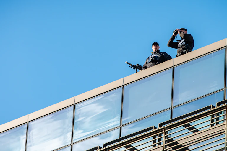 Police snipers on a roof