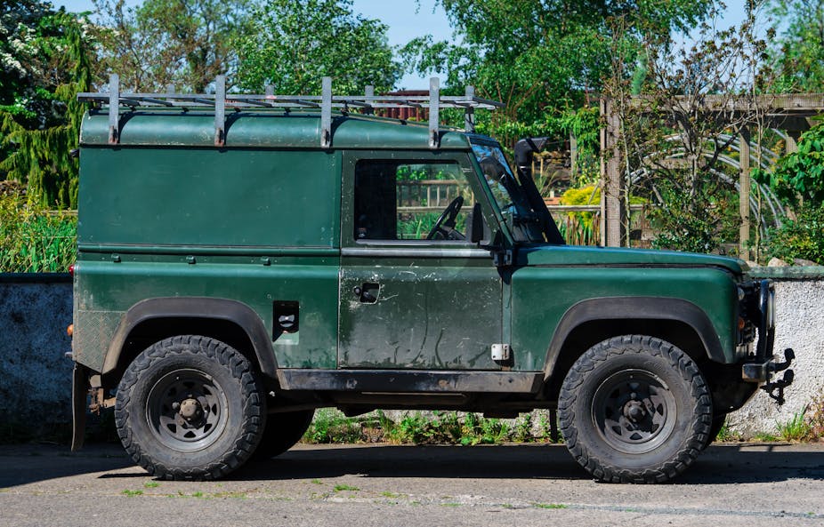 A green Land Rover Defender