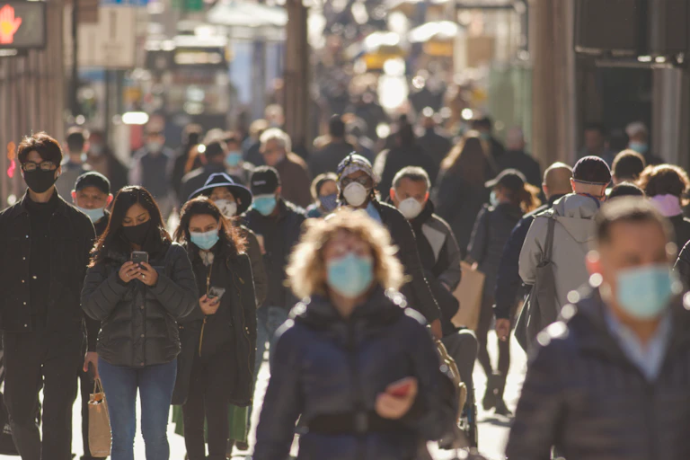 street scene with people in masks