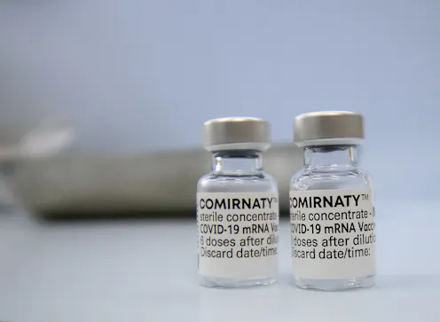 Two vials of the Pfizer COVID-19 vaccine