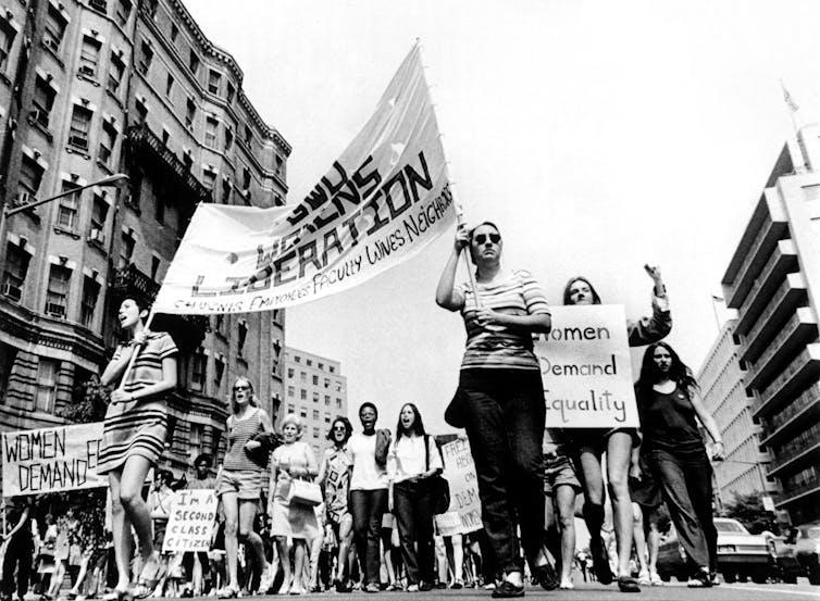 Women marching in the streets of Los Angeles during a women's liberation march 1970s