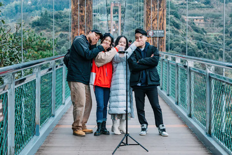 TikTok users record a short video.