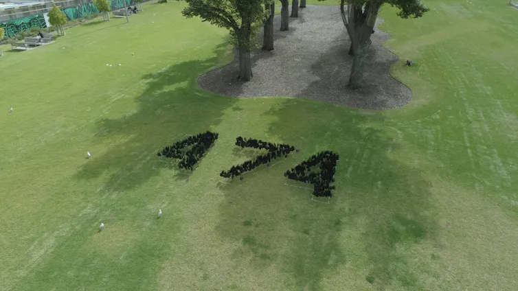 A drone shot of the numbers '474' to symbolise the number of deaths in custody since the royal commission.