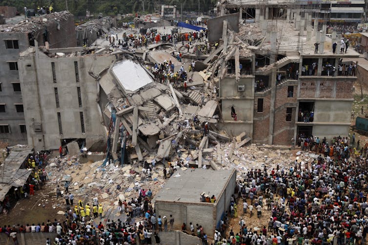 Rescue workers search for survivors in the ruins of the collapsed Rana Plaza building on April 25 2013.