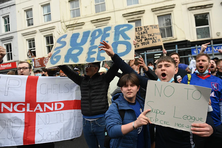 Chelsea fans protesting the ESL proposals as their club became first to withdraw from project.