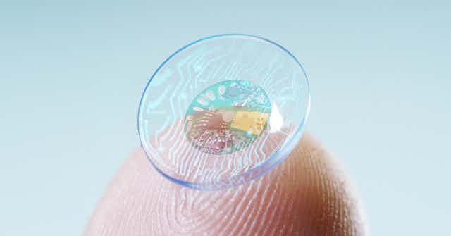A close-up of a contact lens with an implanted chip