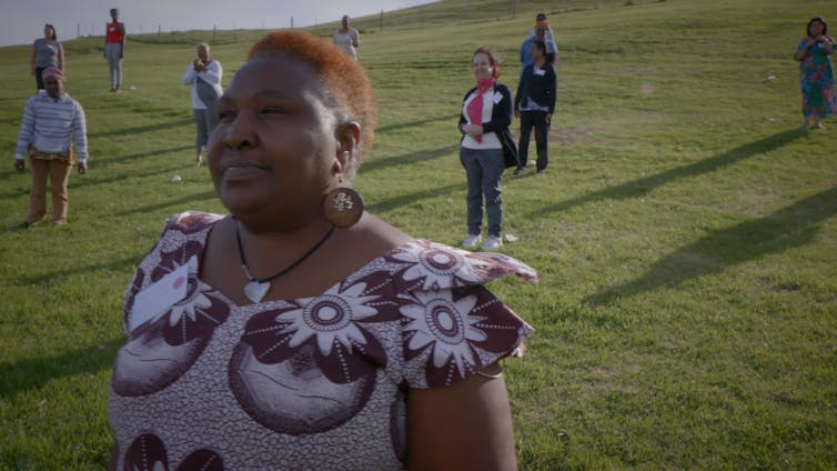 People standing in field