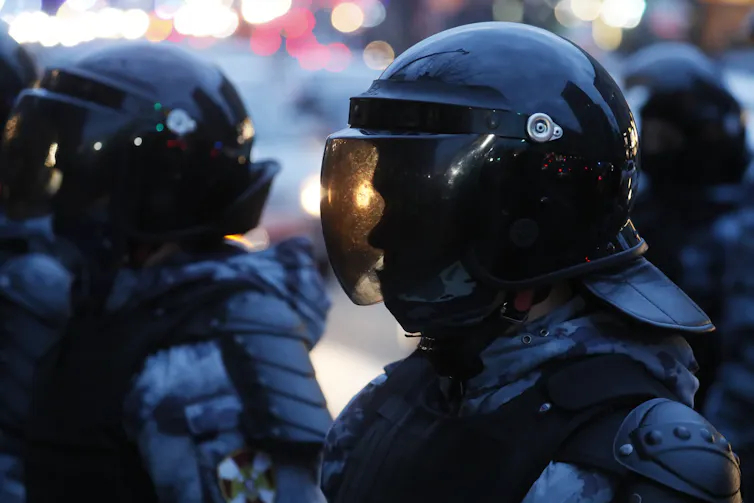 Russian police wearing helmets with full visors at protests against the treatment of dissident leader Alexei Navalny in Moscow, April 21 2021.