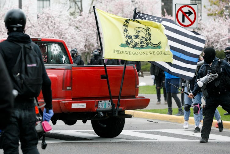 QAnon hasn't gone away – it's alive and kicking in states across the country