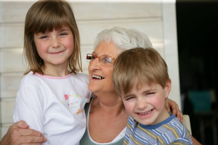 Grandmother with granddaughter and grandson