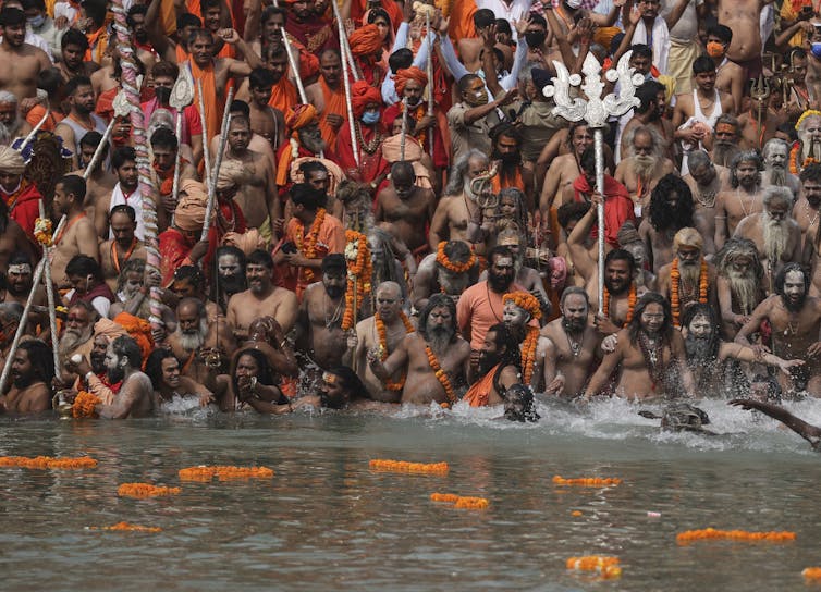 Taking a dip in the Ganges during Kumbh Mela